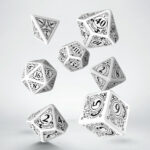 Buy Q Workshop: Steampunk White & Black Dice Set (7) only at Bored Game Company.